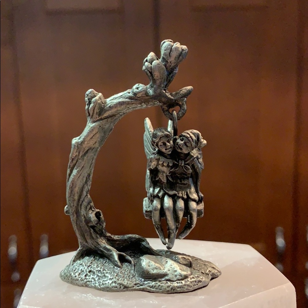 Pewter fairy and elf on swing